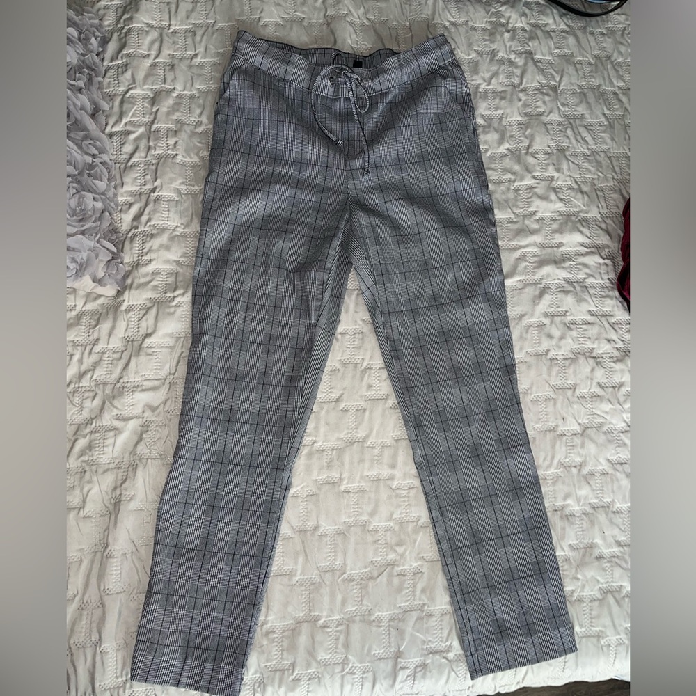 Grey plaid slacks with string tie
